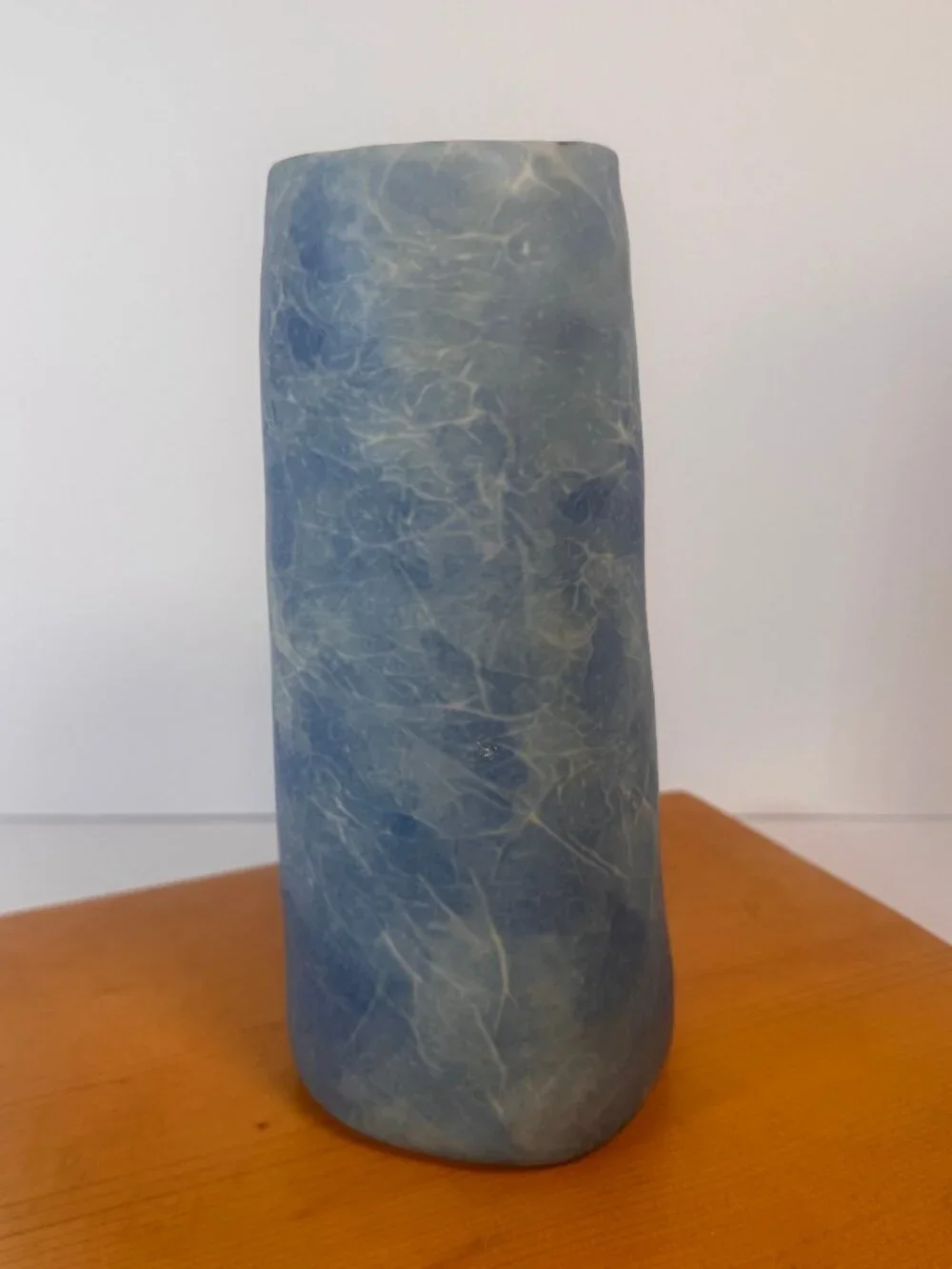 Bud vase or cylinder with blue and white soft cloud like marbled pattern